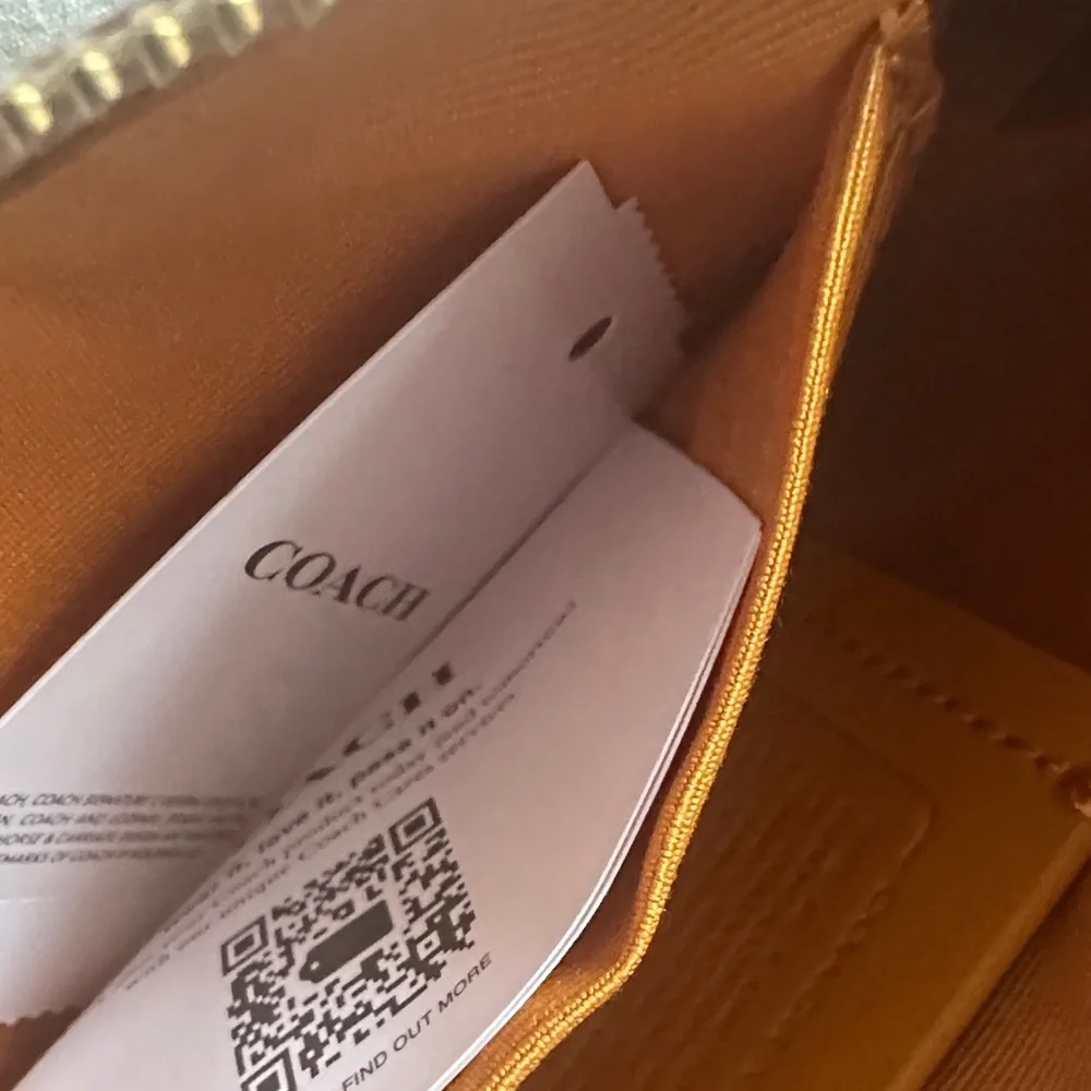 Coach Beige Peanuts Wristlet with Multicolor Character Motif - Picture 5 of 5